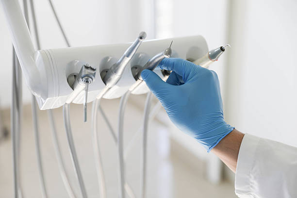Professional Tooth Extraction technician working in Palatine, IL